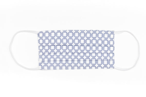 White mask with blue pattern