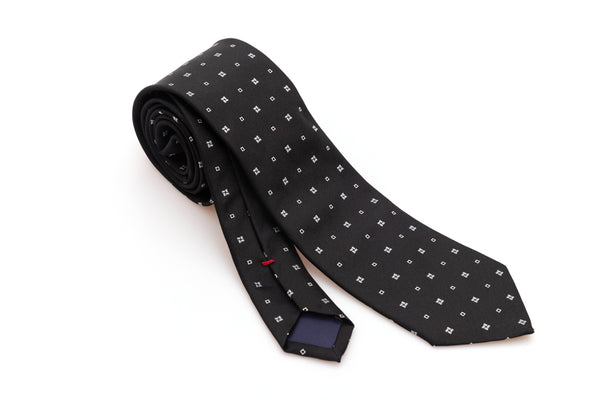 Black tie with white geometry in pure silk