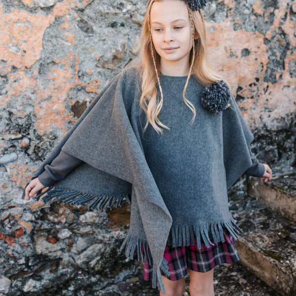 FLEECE CAPE WITH FRINGES