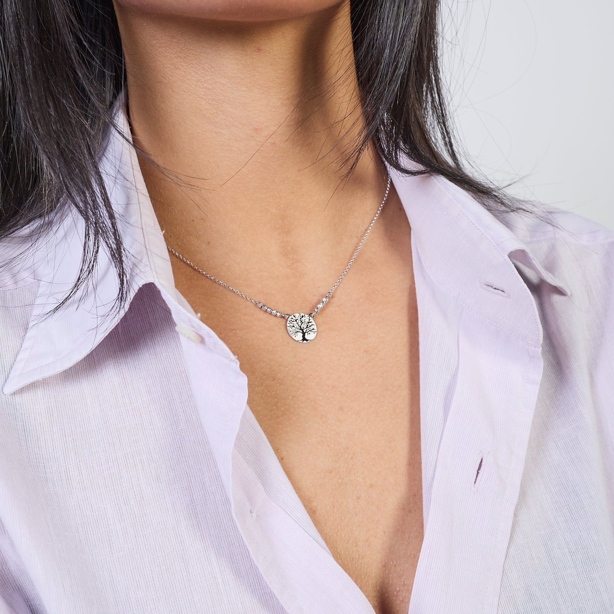 Rhodium-plated silver necklace with faceted spheres and large central tree of life