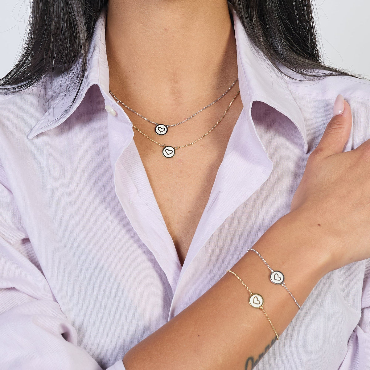 Gold-plated silver necklace with heart disc centerpiece