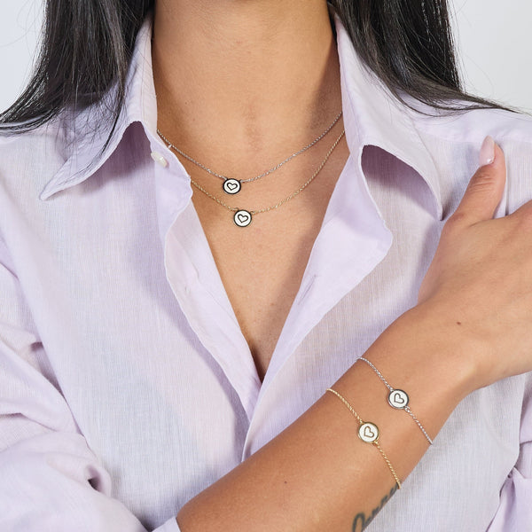 Gold-plated silver necklace with heart disc centerpiece