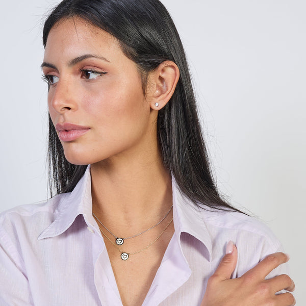 Gold-plated silver necklace with heart disc centerpiece