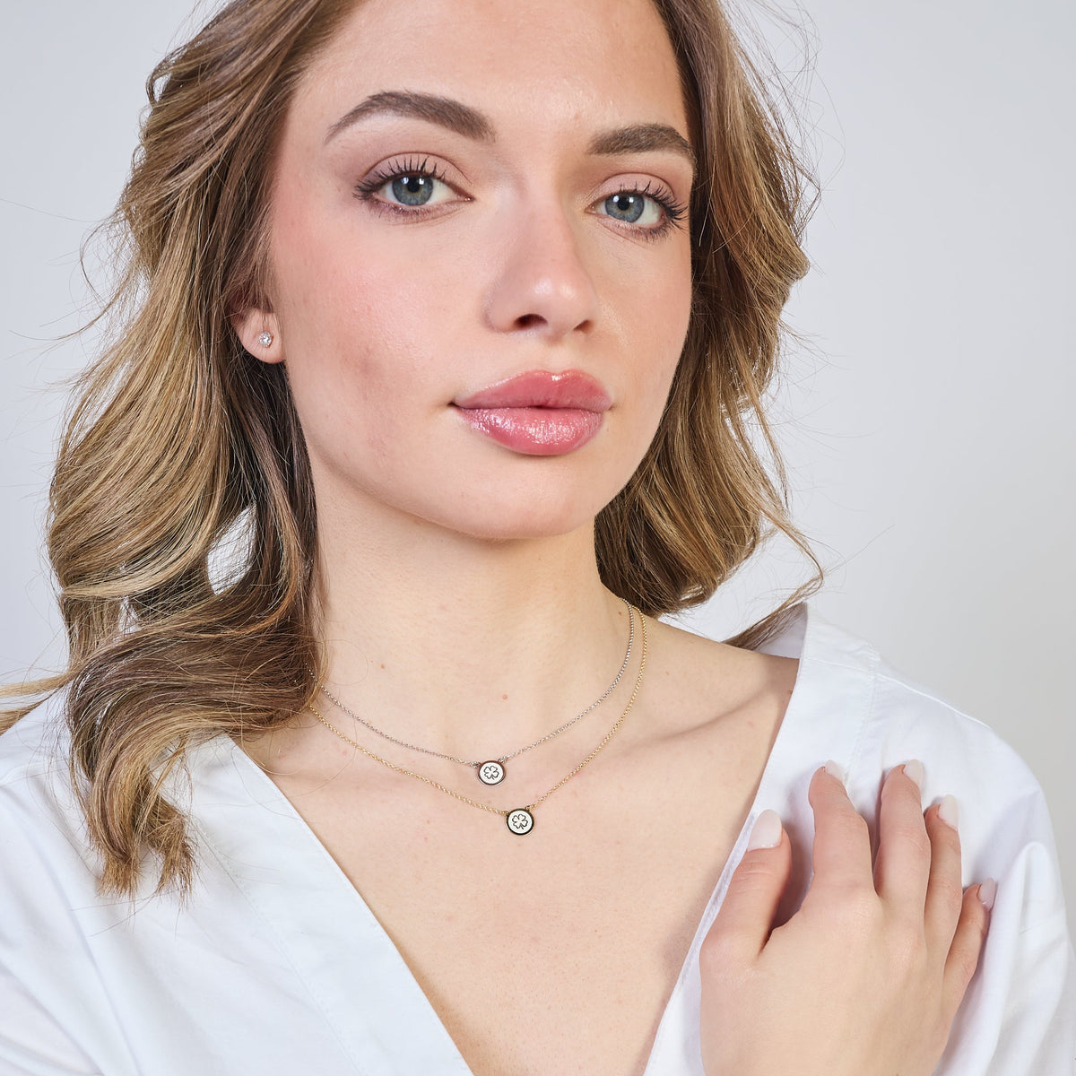 Collana argento rodiato con centrale disco con quadrifoglio