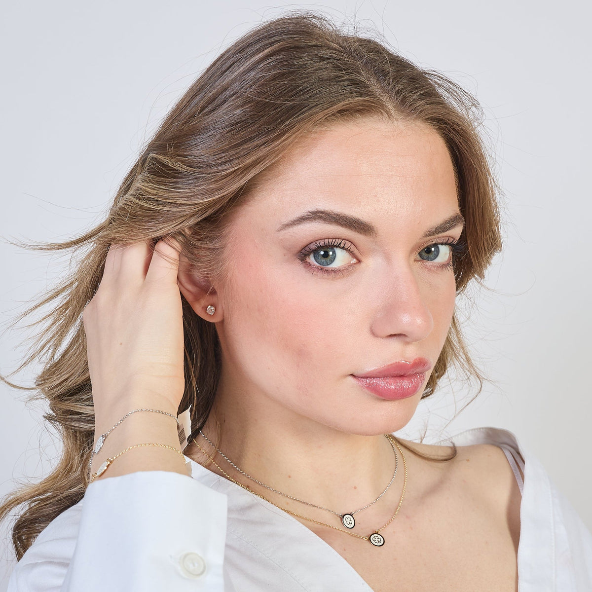 Collana argento rodiato con centrale disco con quadrifoglio