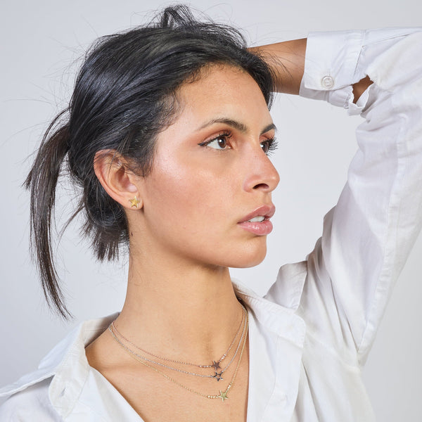 Gold-plated silver necklace with pierced star centerpiece