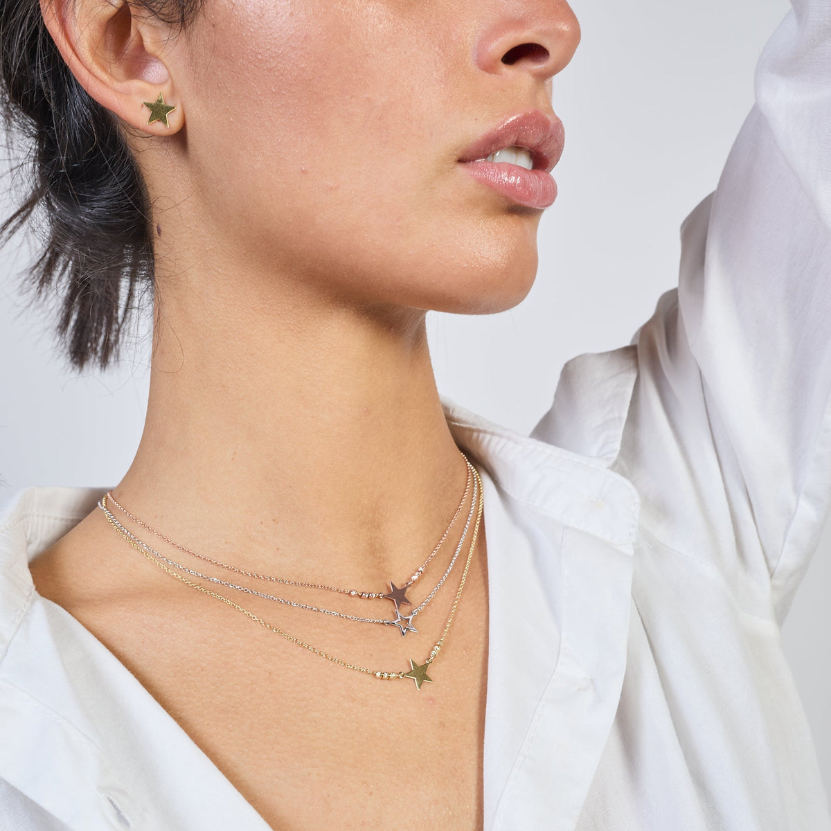 Gold-plated silver necklace with pierced star centerpiece