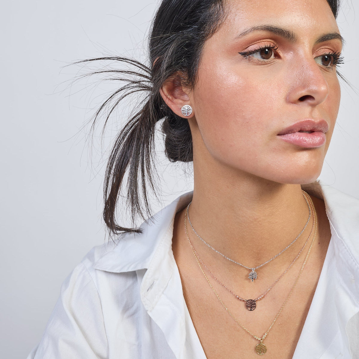 Collana argento rosato con centrale albero della vita traforato tondo