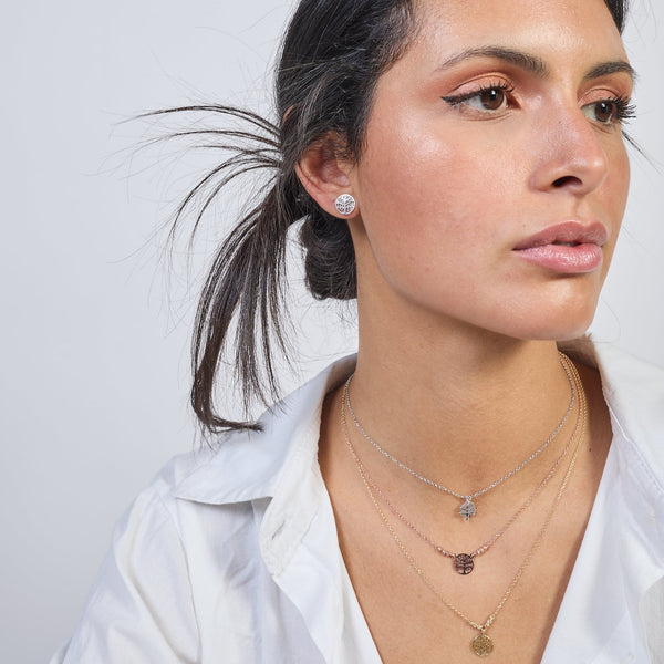Collana argento rosato con centrale albero della vita traforato tondo