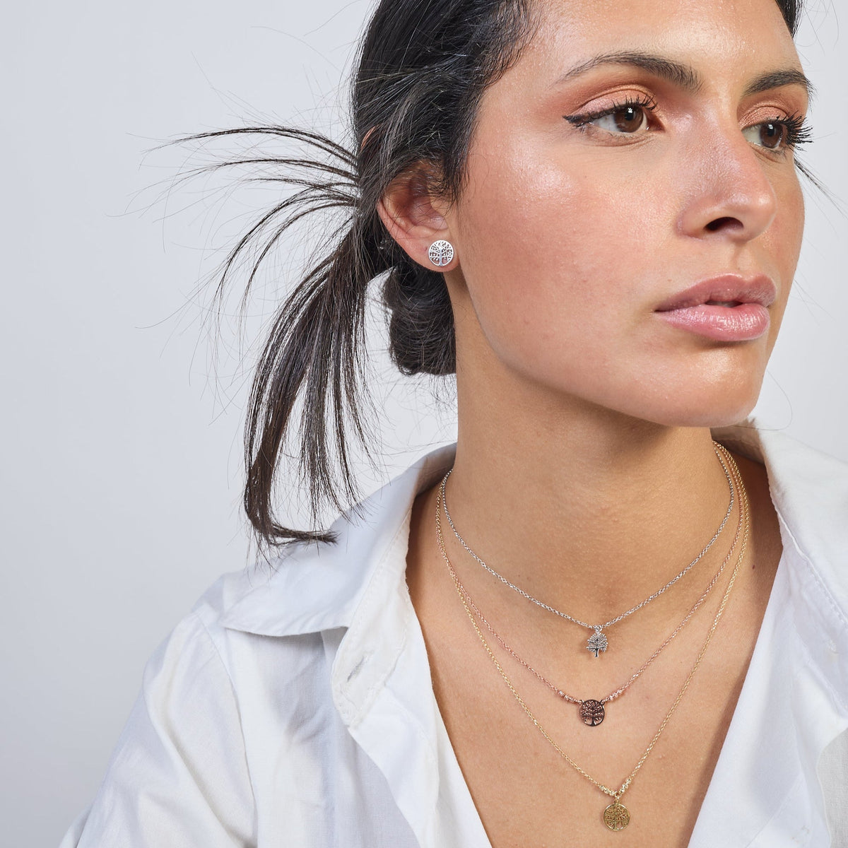 Collana argento rodiato con centrale albero della vita traforato tondo