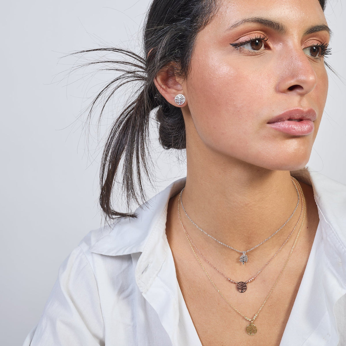 Collana argento dorato con centrale albero della vita traforato tondo