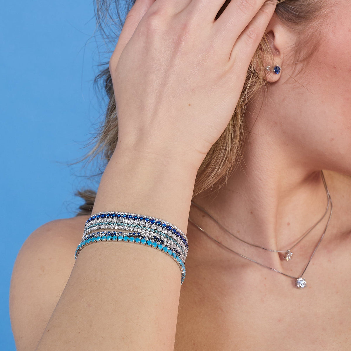 Rhodium-plated silver tennis bracelet with blue and white zirconia mm 2.0