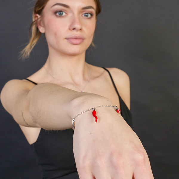 Rhodium-plated silver bracelet with horn and enamel ladybug and clover pendants