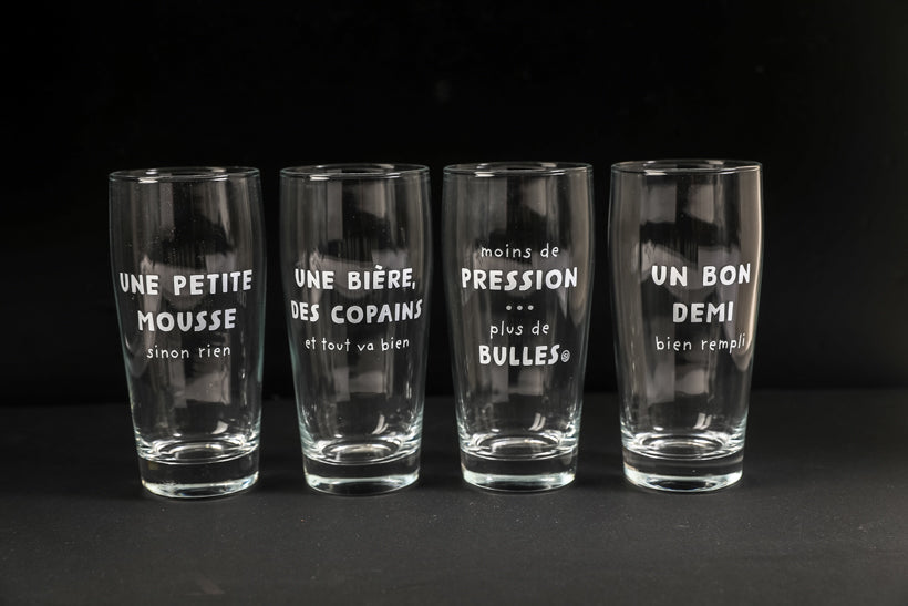 4 beer glasses a little foam or nothing