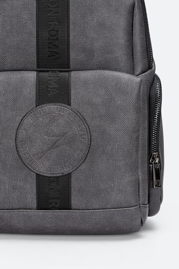 Tristan Textured Blue Backpack with logo and front logo band