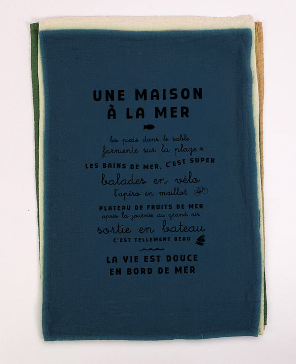 Torchon une maison à la mer