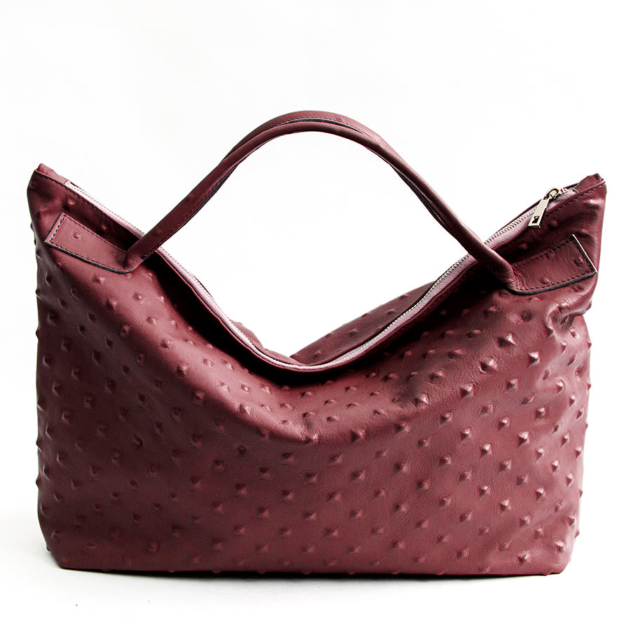 BIKER - soft leather bag with stud print in burgundy
