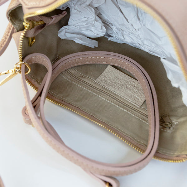 FATIMA - Bag with braided handle in powder leather