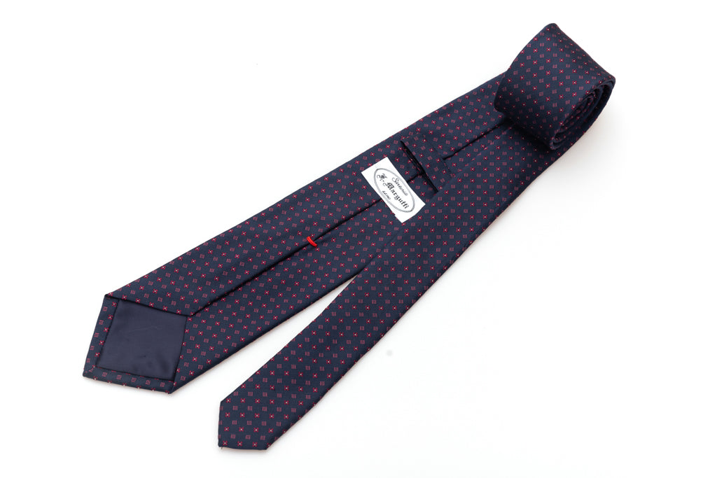 Cravatta blu con geometria in pura seta