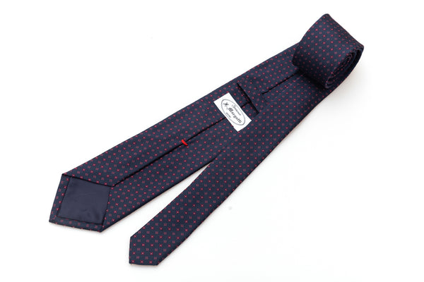 Blauwe stropdas met geometrisch patroon in pure zijde