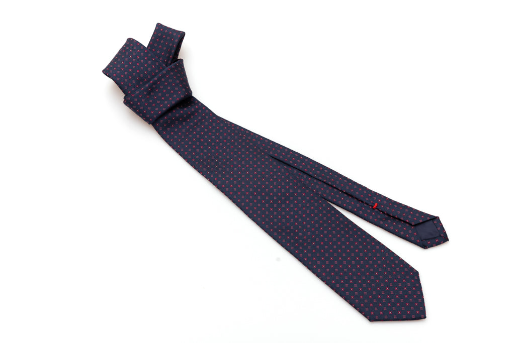 Cravatta blu con geometria in pura seta
