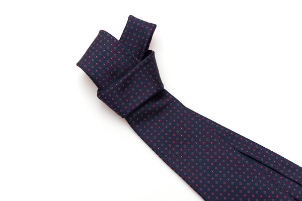 Cravatta blu con geometria in pura seta