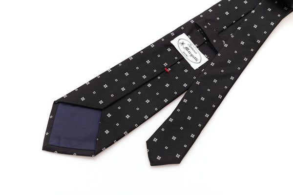 Black tie with white geometry in pure silk