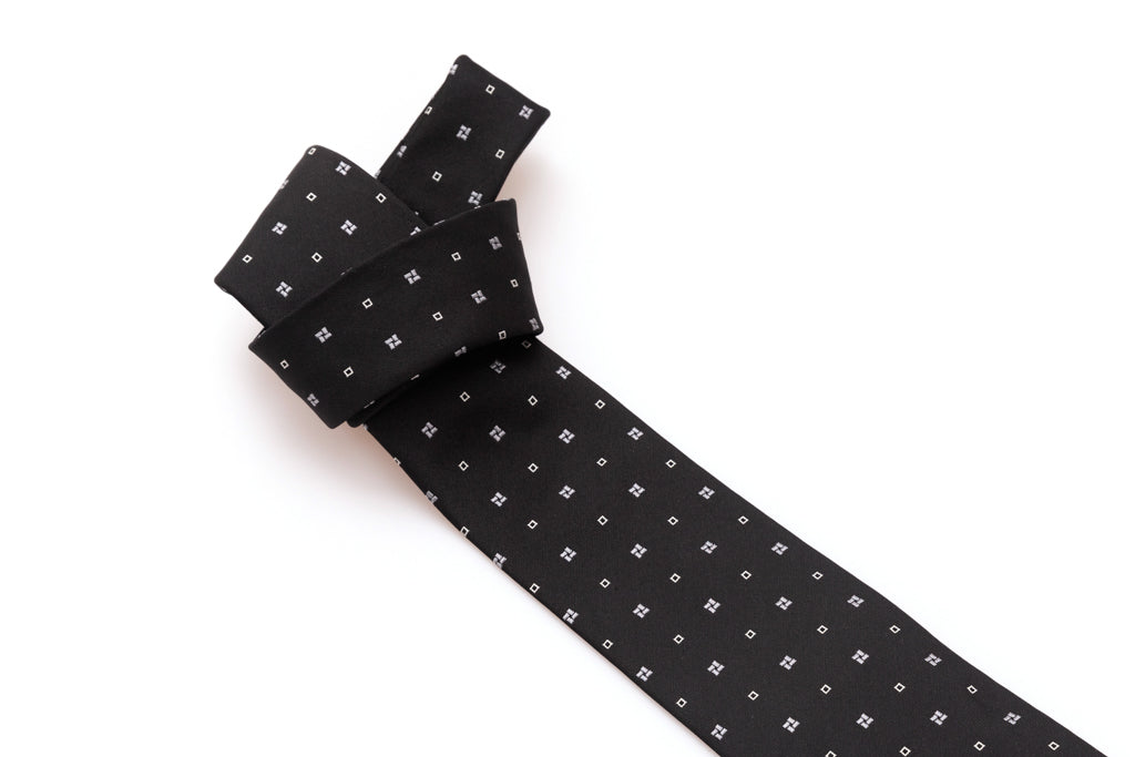 Black tie with white geometry in pure silk