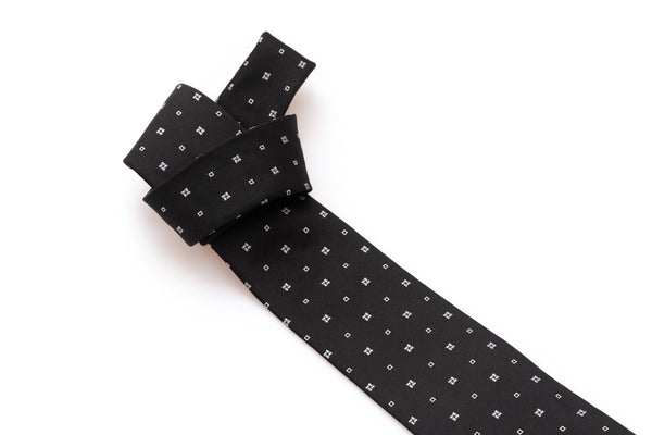 Black tie with white geometry in pure silk