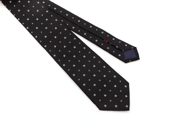Black tie with white geometry in pure silk