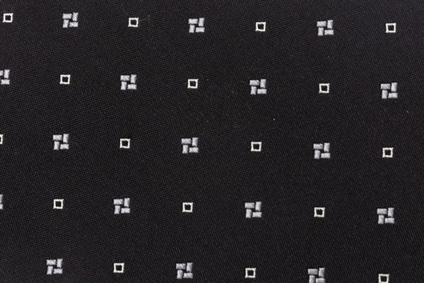 Black tie with white geometry in pure silk
