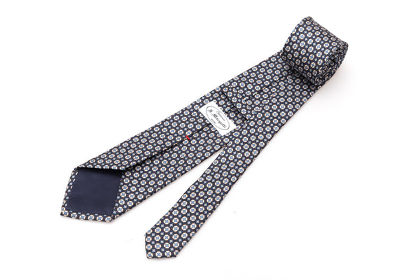 Blue tie with white and light blue geometry in pure silk