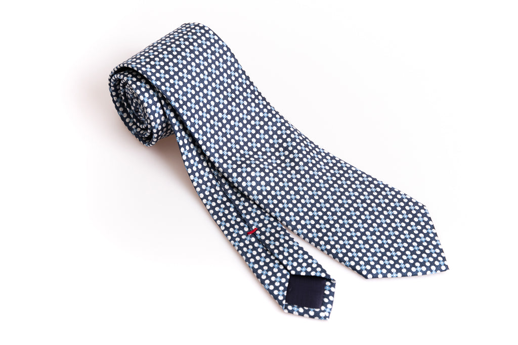 Blue tie with light blue and white pattern 100% silk