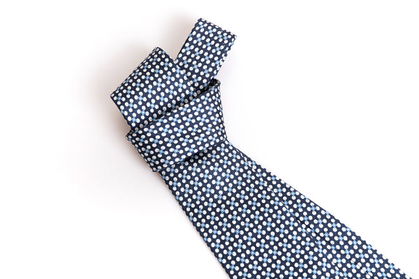 Blue tie with light blue and white pattern 100% silk