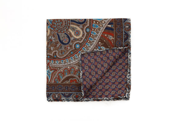 Beige clutch with red and blue pattern in pure silk