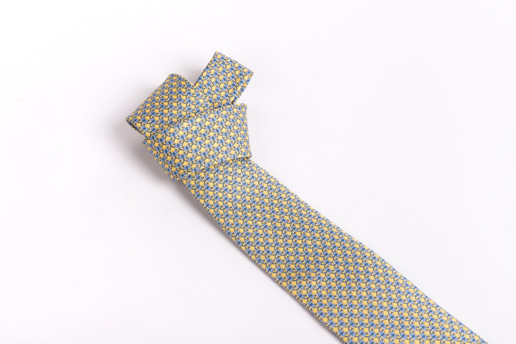 Yellow patterned tie in pure silk