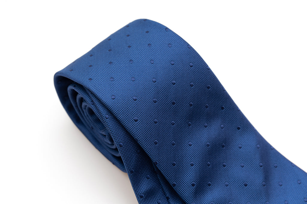 Blue tie with embroidered polka dots in pure silk
