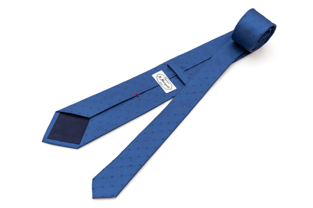 Blue tie with embroidered polka dots in pure silk