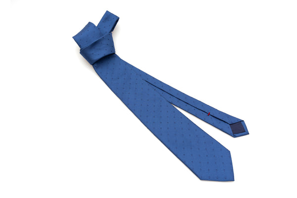 Blue tie with embroidered polka dots in pure silk