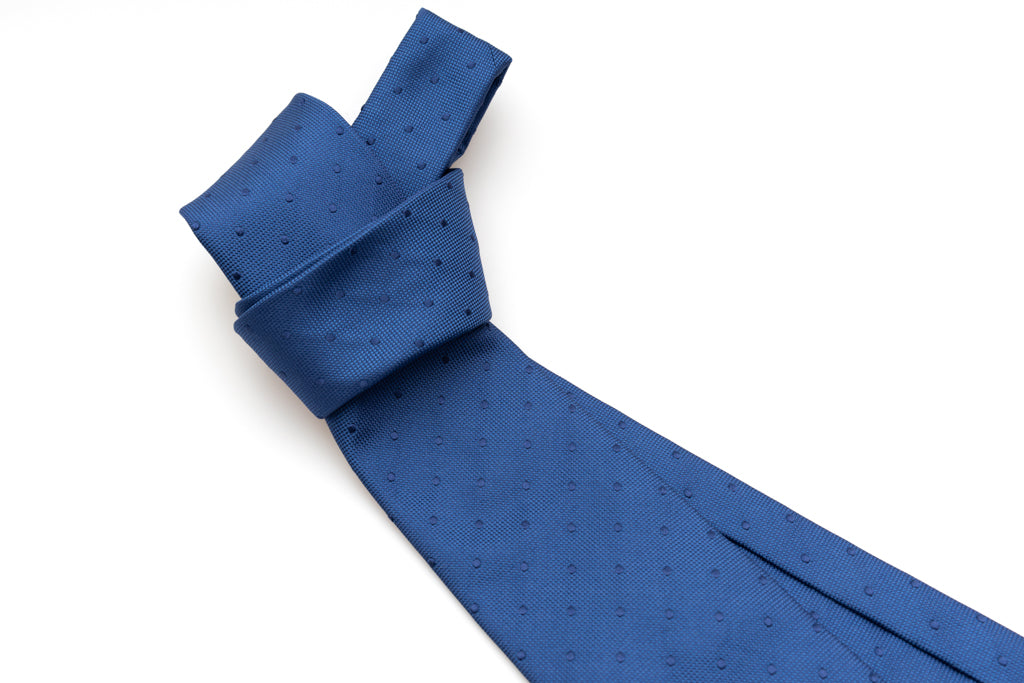 Blue tie with embroidered polka dots in pure silk