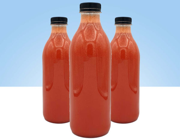 zumo recien exprimido de naranja y fresa