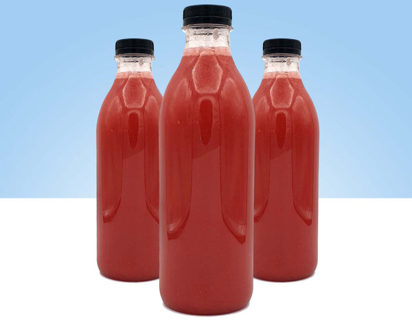 zumo natural recien hecho de fresa y frambuesa