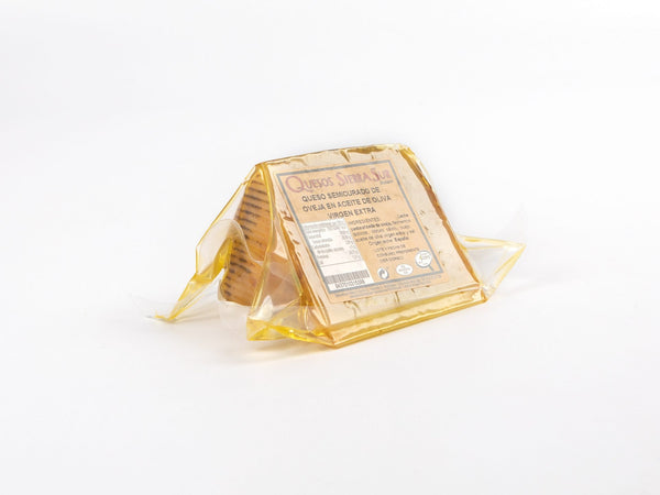 Cuña de queso de oveja semicurado en aceite