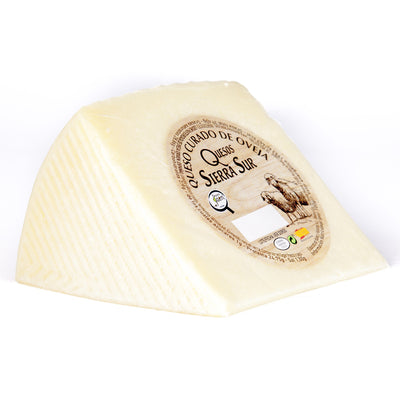 Aged sheep cheese wedge