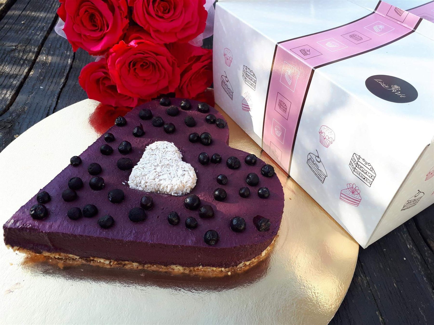 Blueberry heart cake with blueberry topping