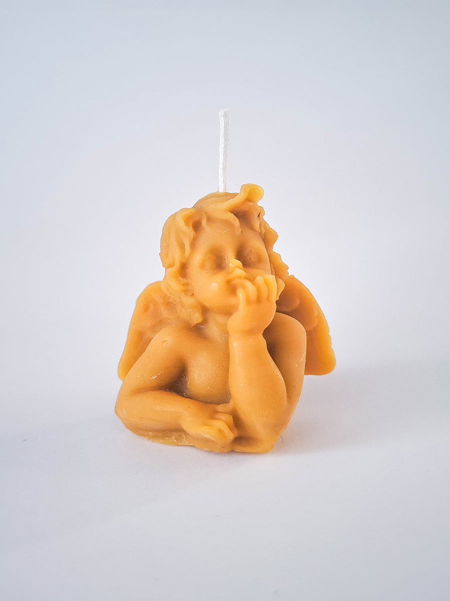 Candle little thinking angel