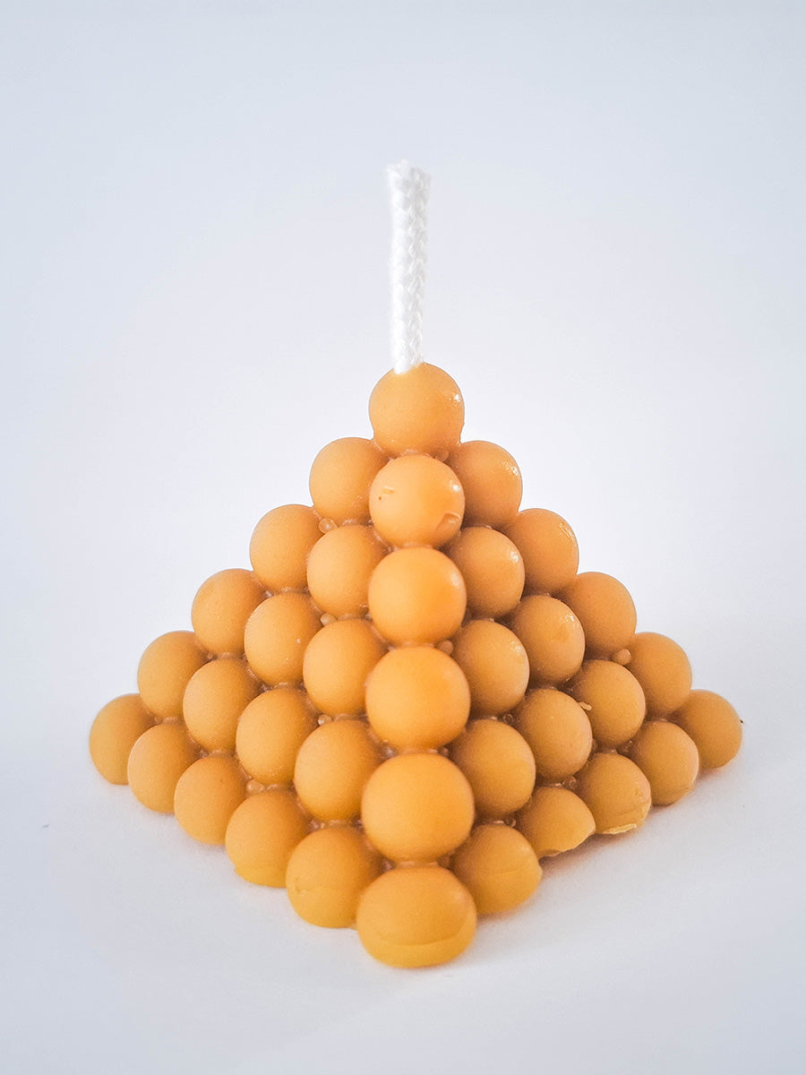 Pyramid candle