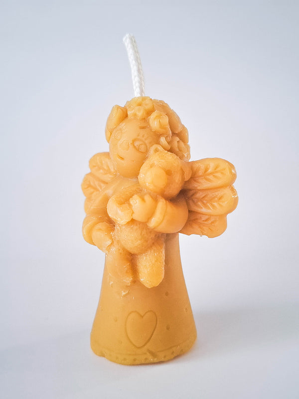 Angel candle with teddy bear