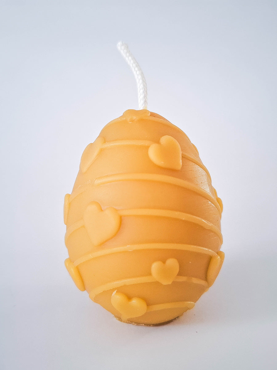 Egg candle with hearts