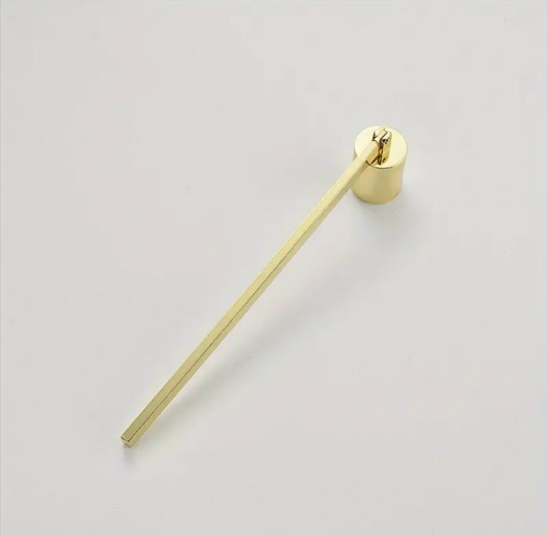 Candle snuffer in gold color